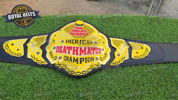 American Deathmatch Wrestling Title Belt mirrored gold center, layered side plates, adjustable strap Crafted by Royal Belts