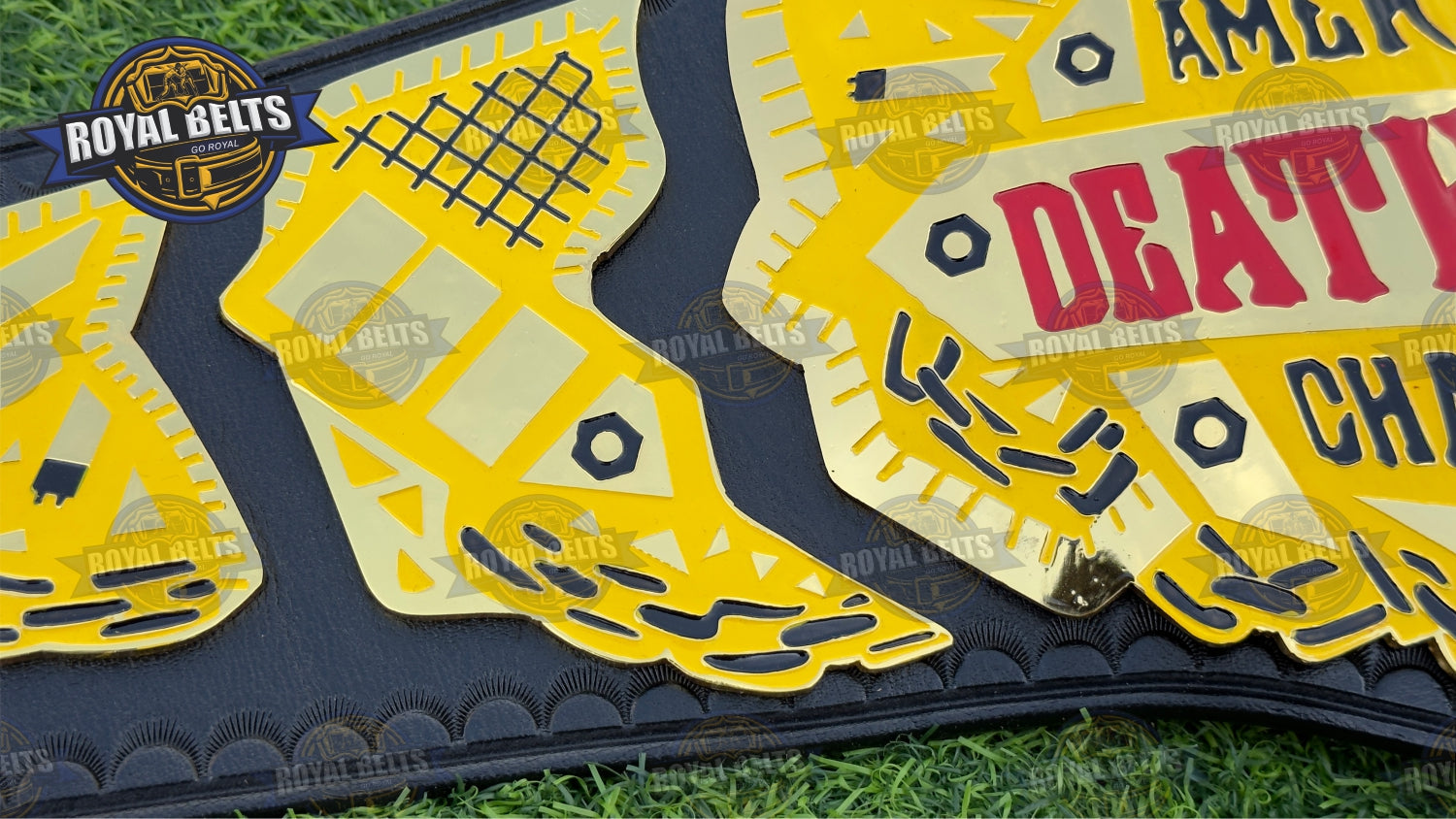 American Deathmatch Championship Belt embossed center artwork, layered side plates, stitched leather strap
