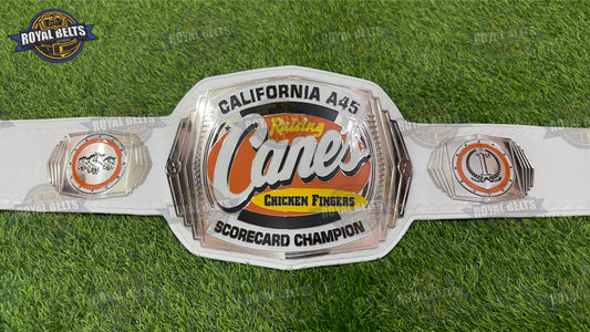 California Raising Cane’s custom title belt with logo center plate, chrome plated metal, white leather strap Made by Royal Belts