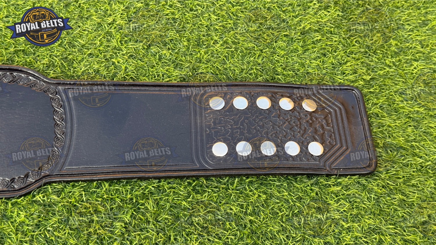 Custom Canadian title belt with raised chrome maple emblem, thick plates, smooth leather backing