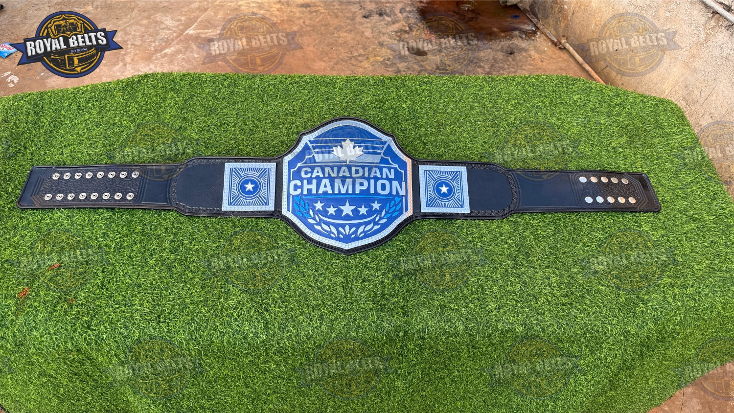 Canadian wrestling championship belt with layered maple leaf plates, high gloss chrome, adjustable leather