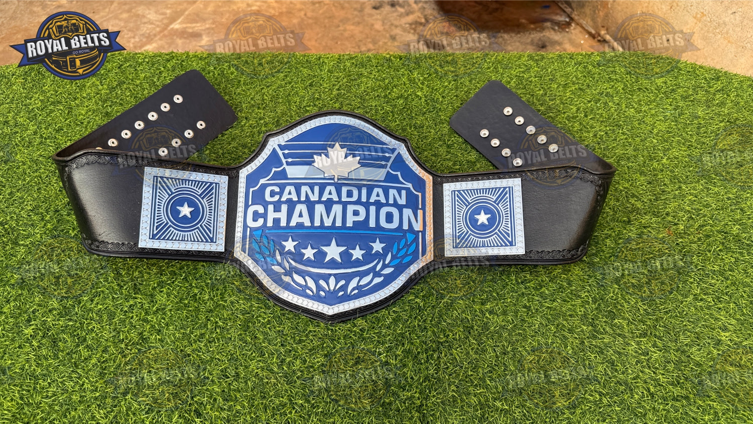 Custom Canadian title belt featuring etched maple leaf center plate, premium zinc plates, leather backing