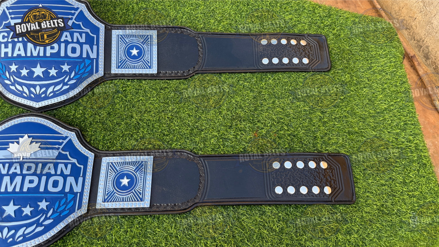 Canadian custom wrestling belt displaying bold maple leaf plate, thick metal plates, durable leather