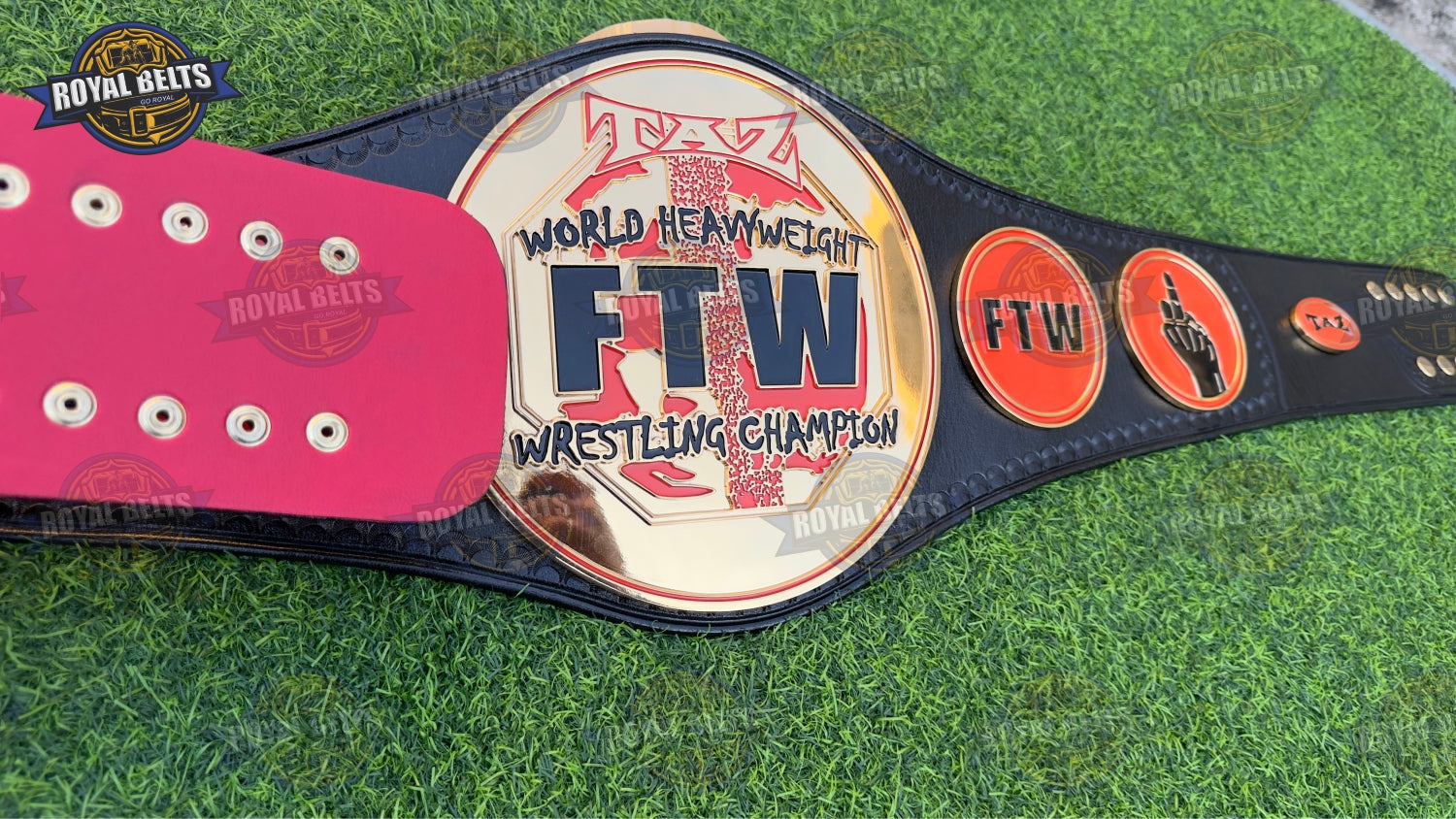 FTW World Heavyweight Championship belt with bold center plate and smooth leather backing