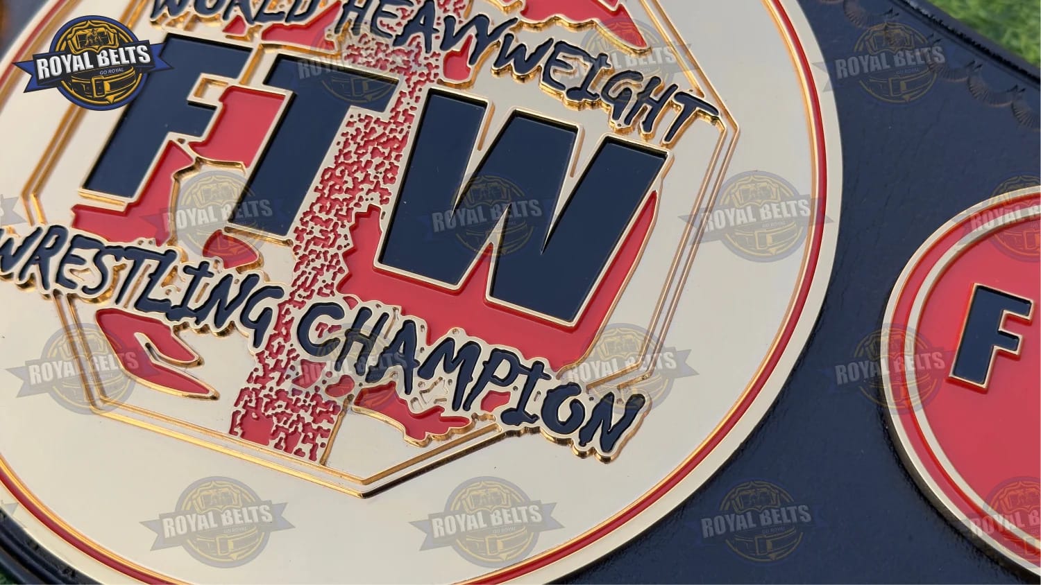 FTW World Heavyweight title belt designed with precision CNC engraving and black strap
