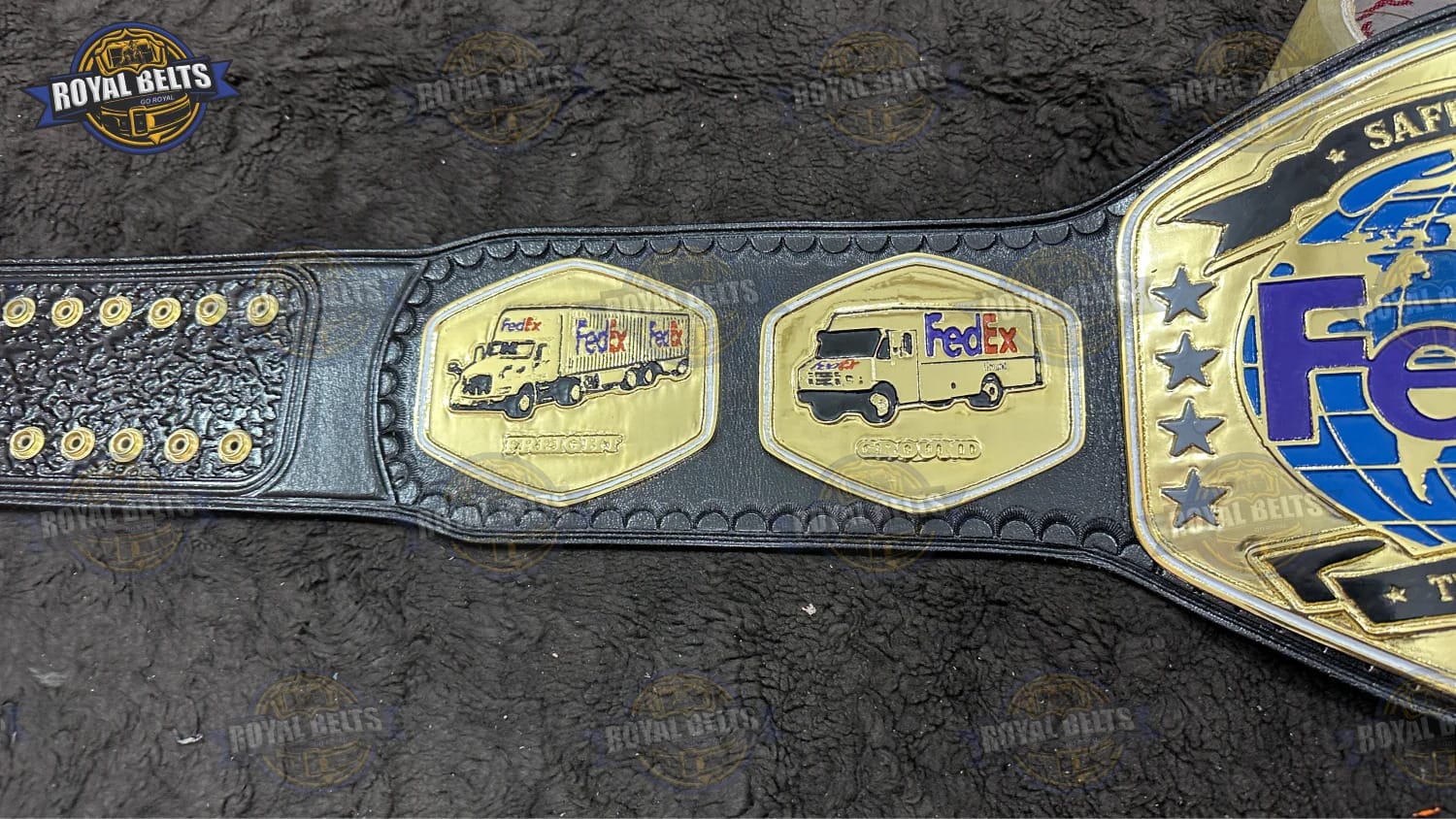 FedEx employee award title belt featuring clean borders and high shine gold tone