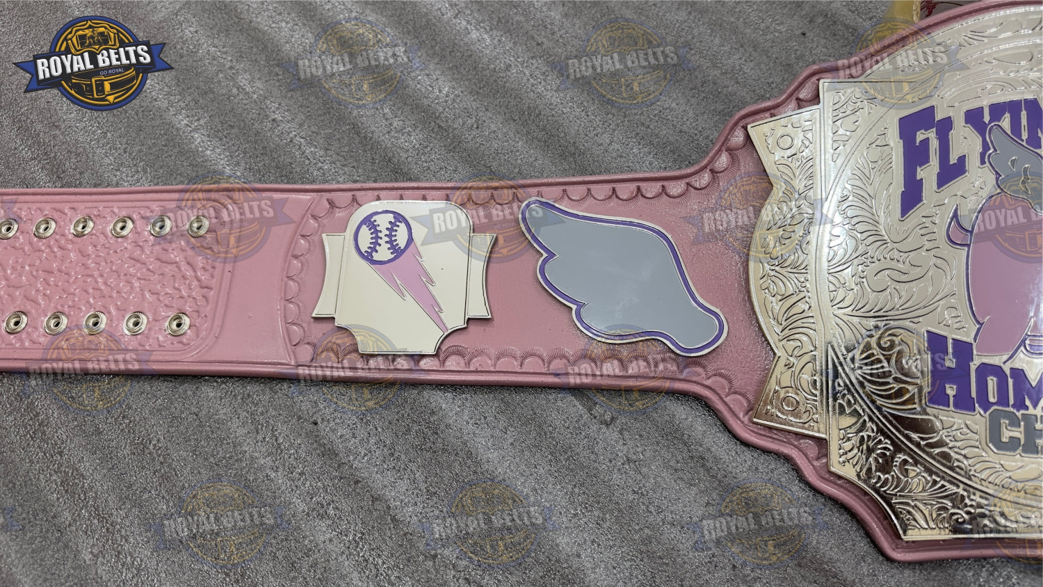 Custom Flying Pigs title belt designed with deep etched details and flexible adult waist sizing