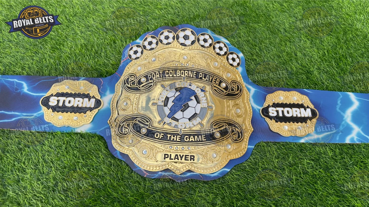 Football custom championship title belt with gold center plate, blue leather strap, engraved football design Made by Royal Belts