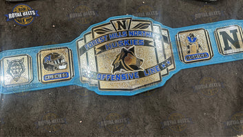 Forest Hills custom title belt featuring engraved team logo and polished gold finish Crafted by Royal Belts