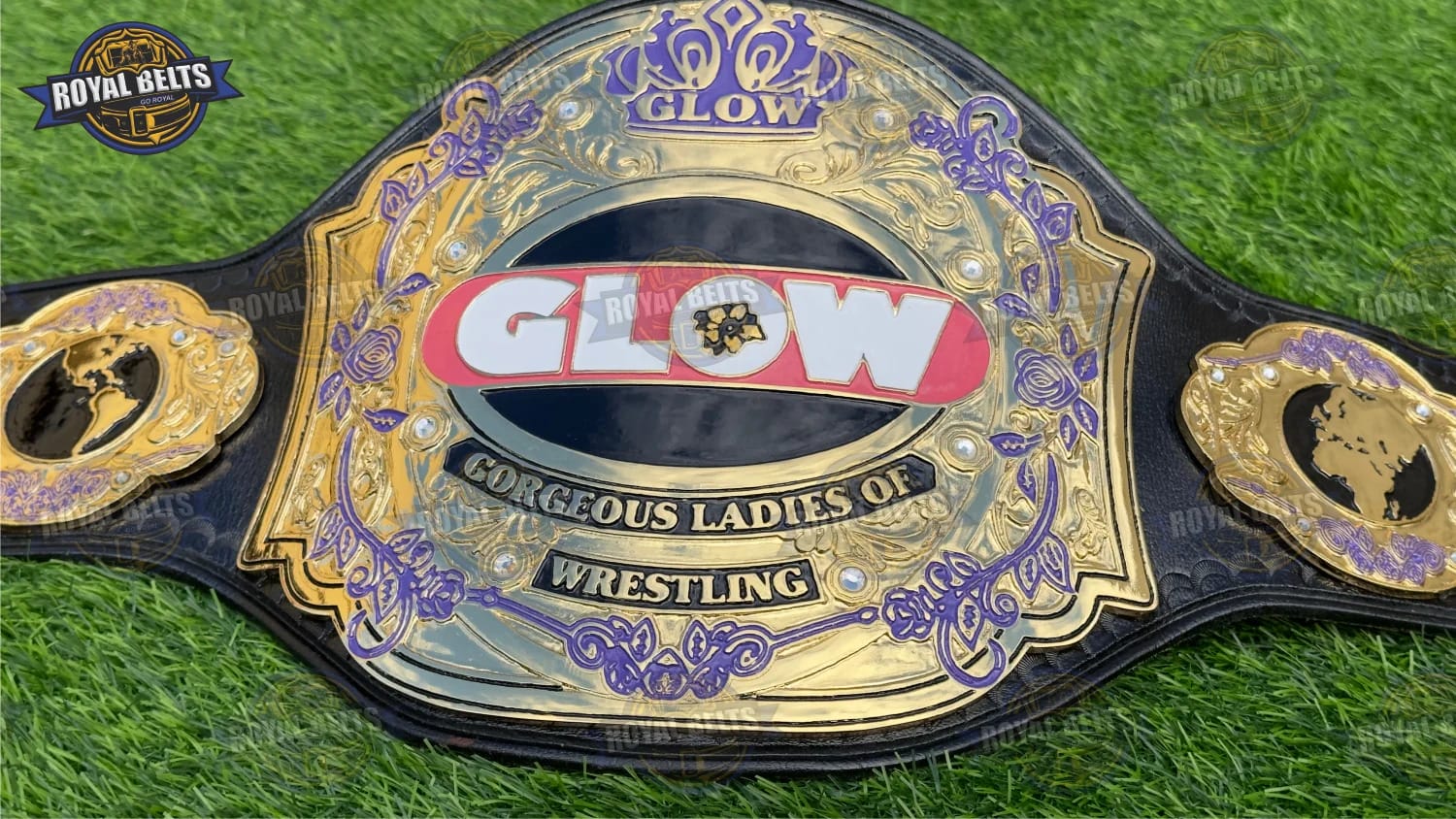 Custom GLOW championship belt showing raised center plate and smooth leather texture Made by Royal Belts