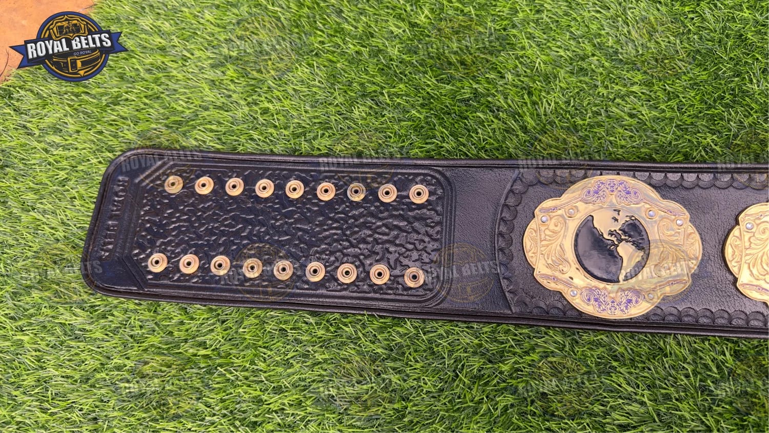 GLOW title belt crafted with premium stitched leather and high shine metal plates