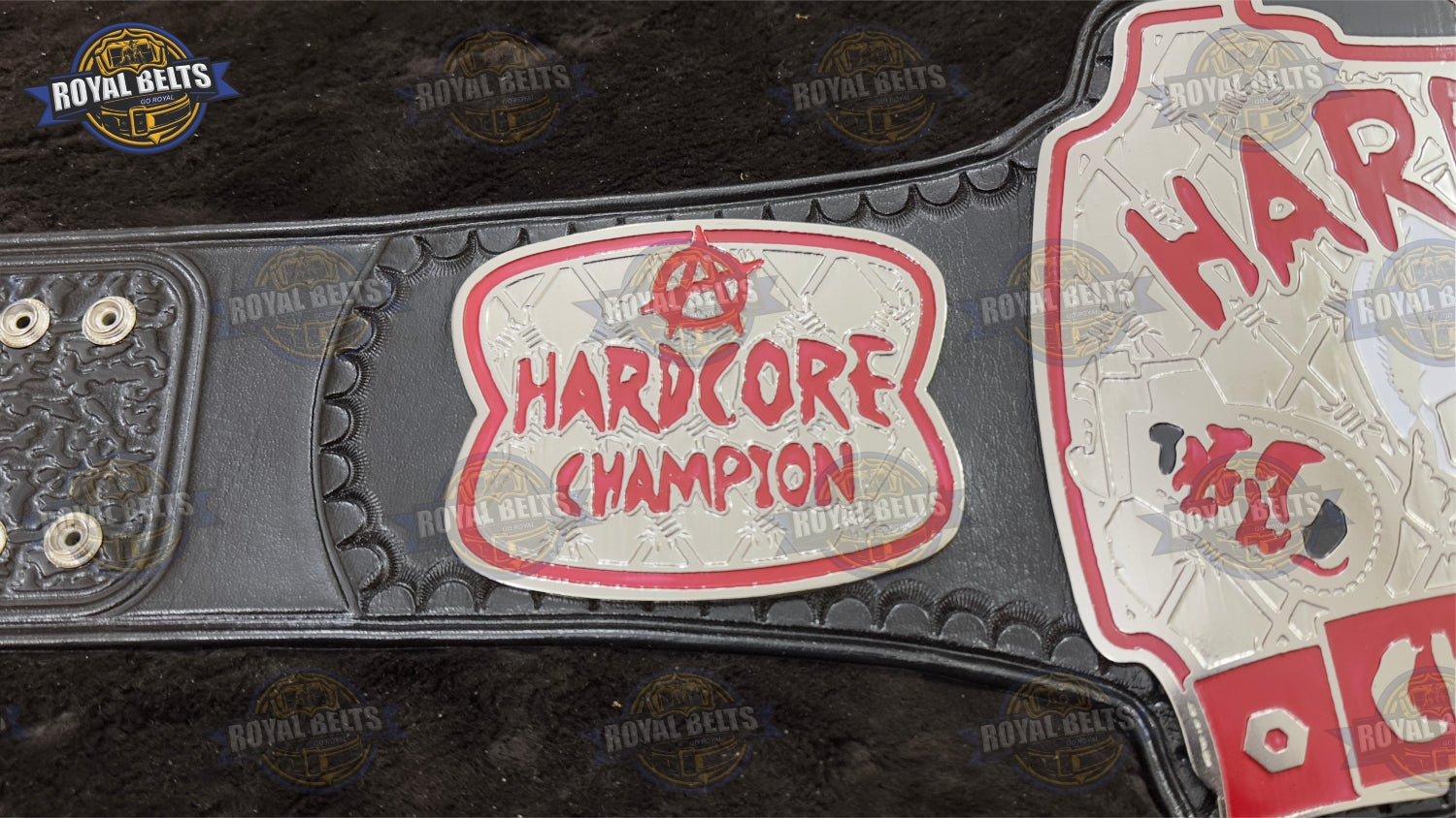 Hardcore championship title belt with stitched black leather strap