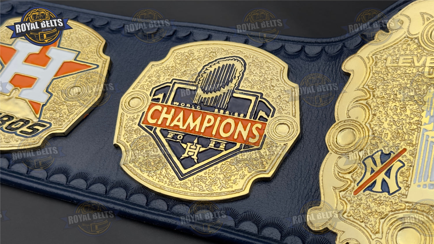 Houston Astros WWE championship belt with bright gold tone and smooth black strap texture