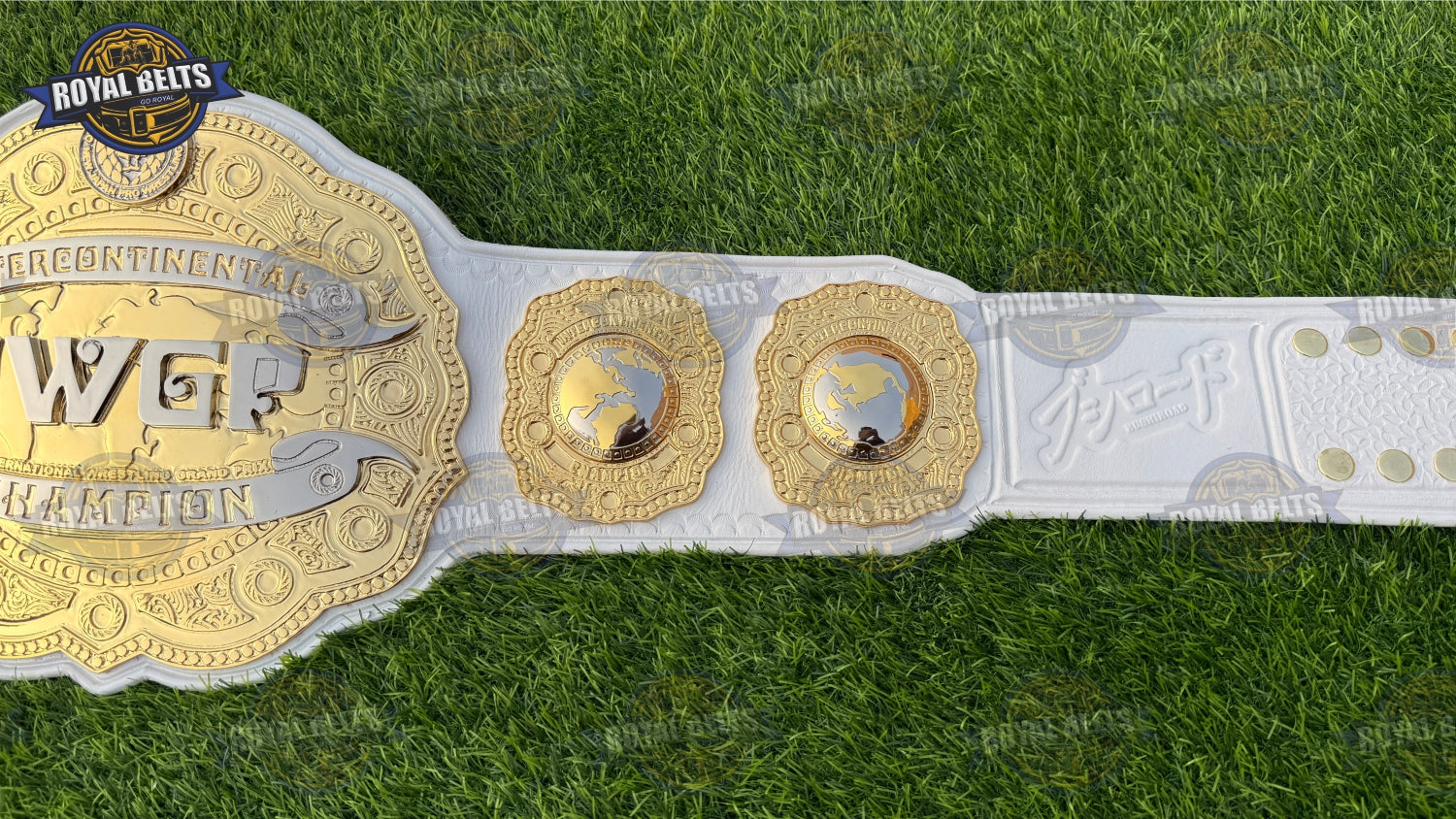 IWGP Intercontinental title belt featuring ornate dual engraving and leather strap