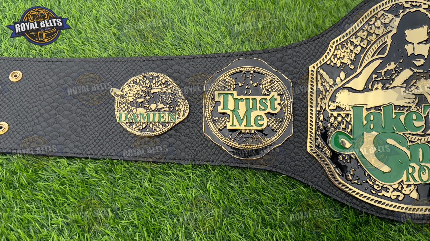 Jake Snake wrestling title belt with polished gold finish and snap closures Made by Royal Belts