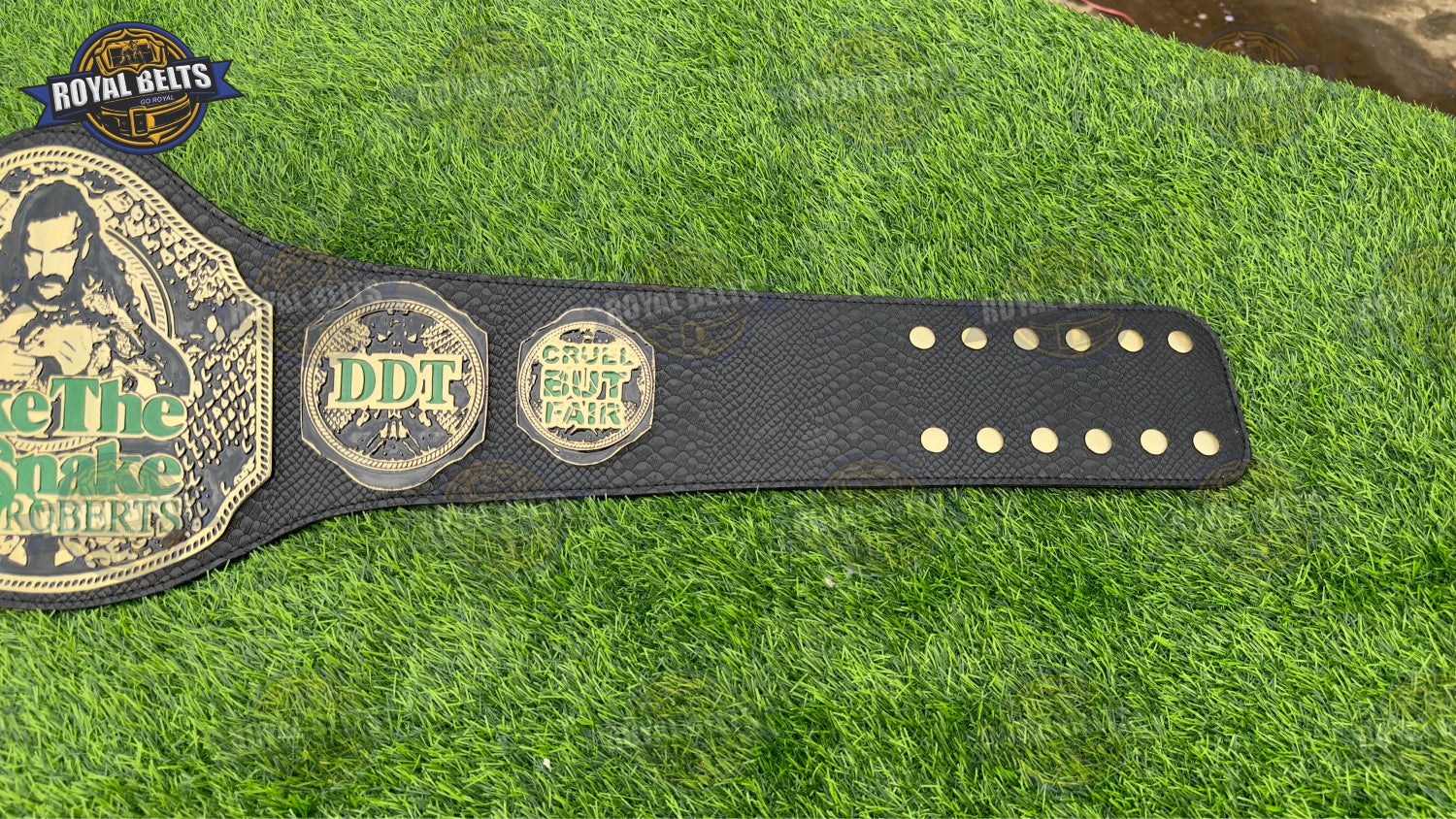 Jake The Snake heavyweight championship belt with thick leather strap
