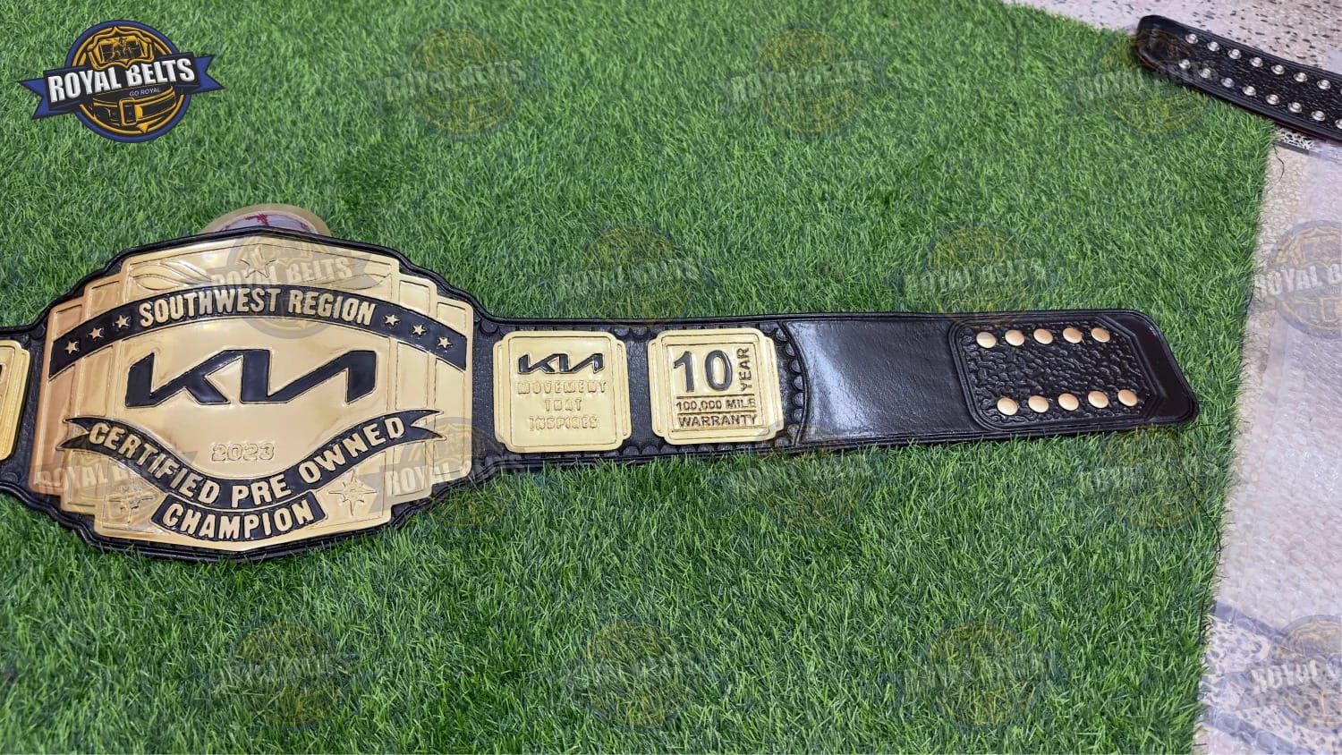 Southwest Region custom title belt with KIA branding and stitched leather construction