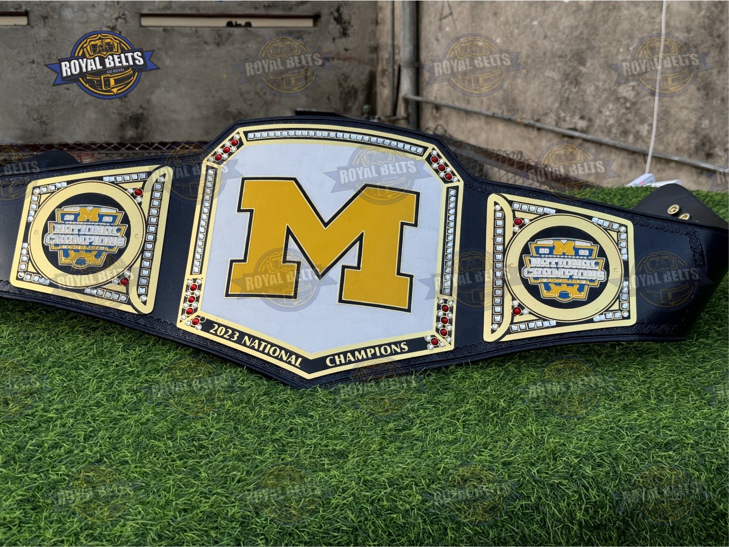 Michigan Wolverines custom WWE Legacy title belt with black and gold design Manufacture by Royal Belts 