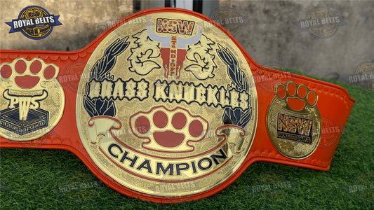 NSW custom brass knuckle championship belt with knuckle center plate, gold plated brass, red  leather Crafted by Royal Belts