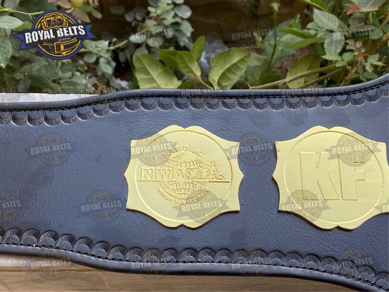 NWA Junior Heavyweight Title Belt embossed globe design, beveled edges, stitched leather backing