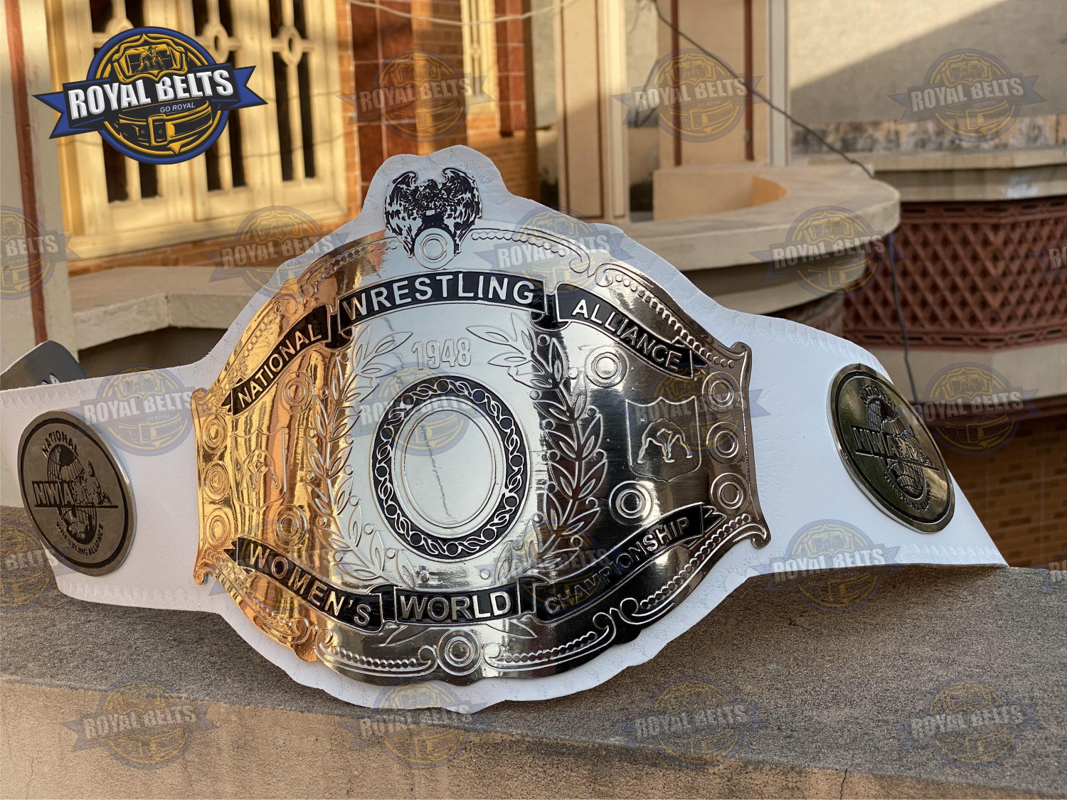 NWA Women’s Championship Belt with brass plated center plate, engraved logos, white leather strap, adjustable Made by Royal Belts
