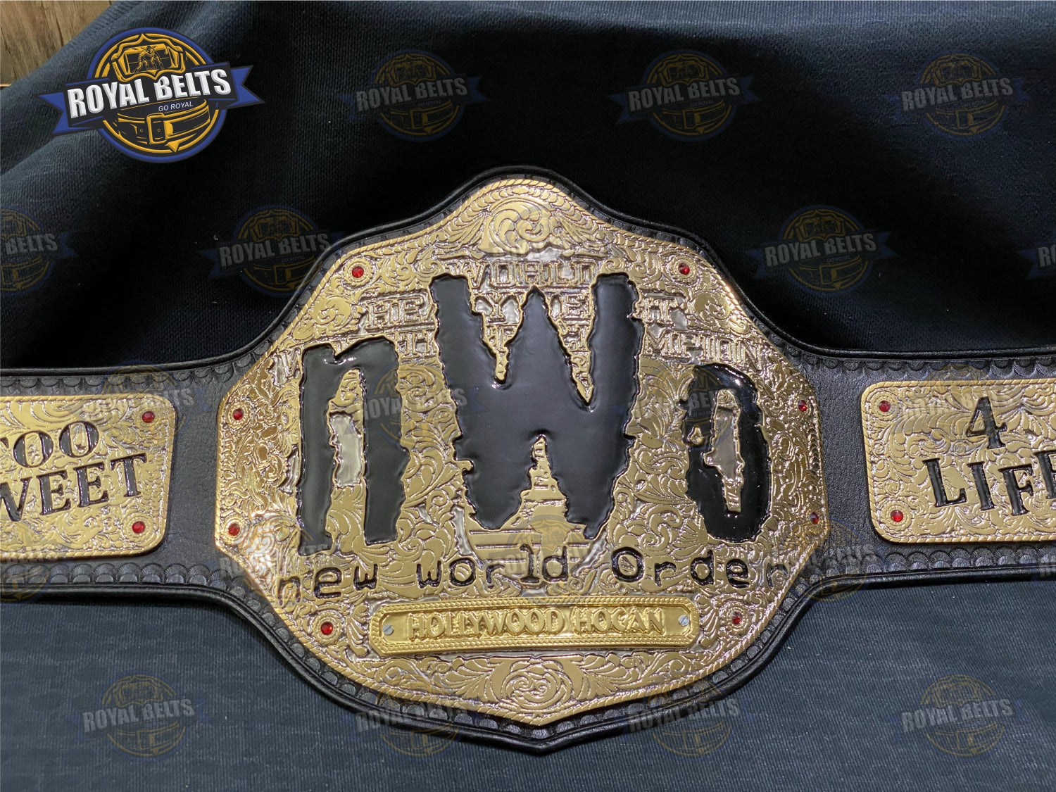 NWO Big Gold For Life Championship Belt with large gold plated center plate, black leather strap, raised logo Manufacture by Royal Belts