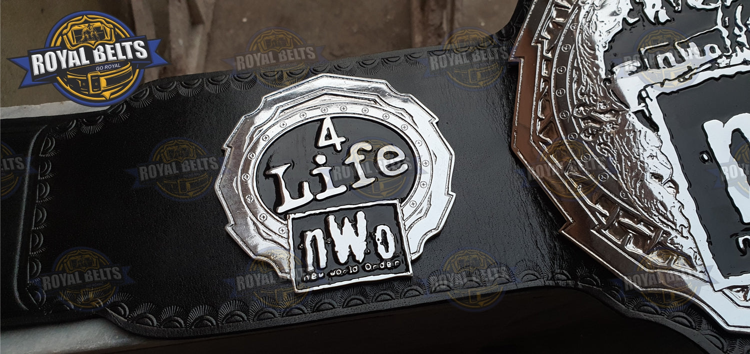 NWO Zinc Title Belt showcasing bold engraved NWO logo, premium replica craftsmanship, genuine cowhide leather strap