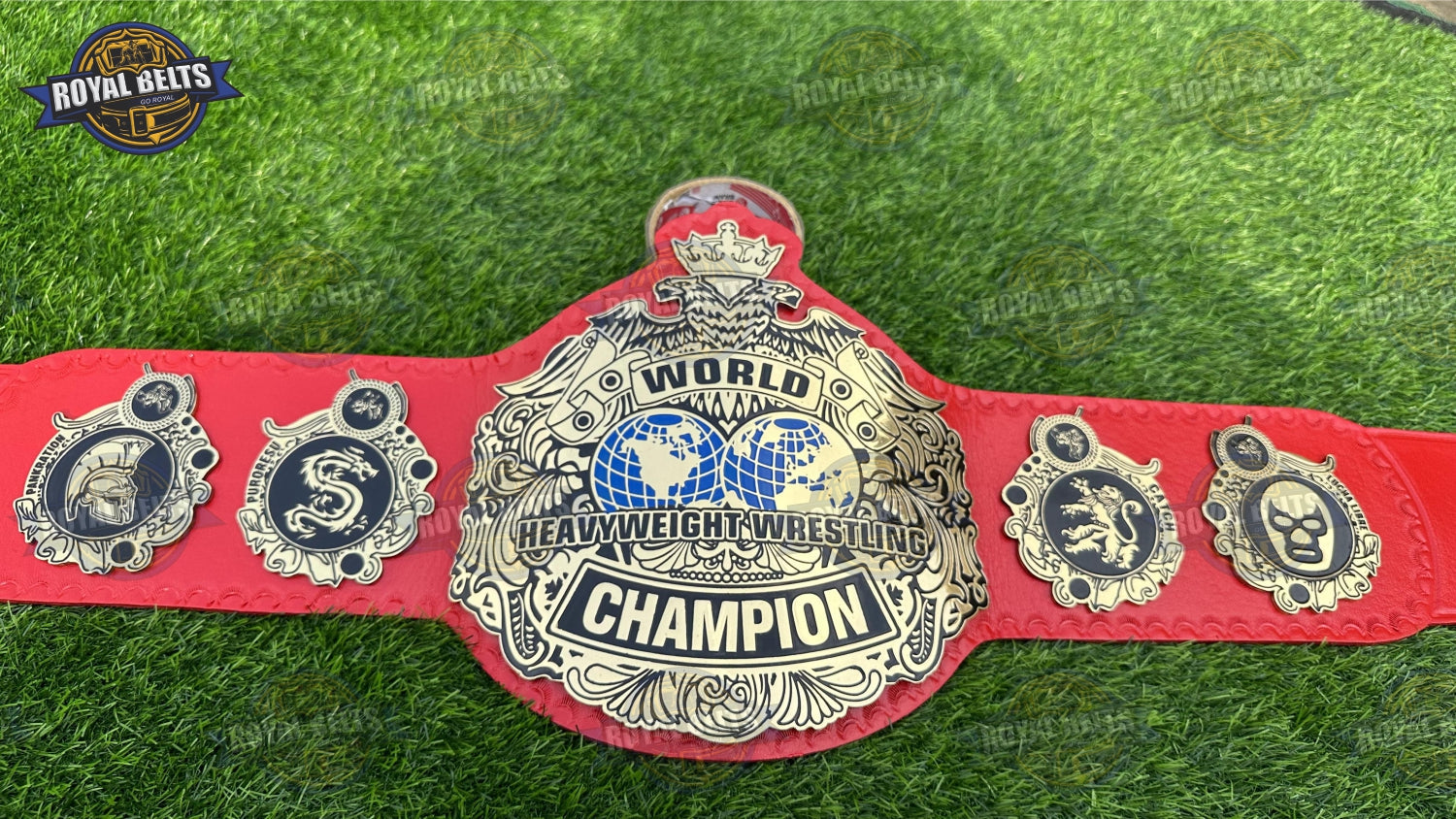World Heavyweight wrestling belt featuring red leather backing, polished gold plates, engraved detailing Crafted by Royal Belts