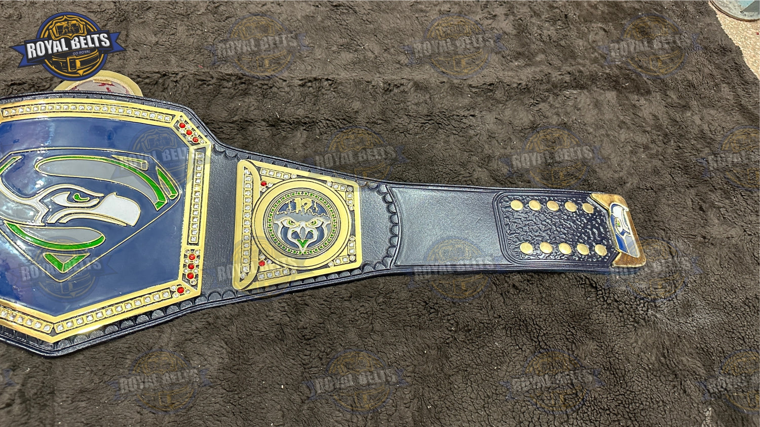 Seattle Seahawks championship belt with ornate side plates, high gloss finish, reinforced leather strap