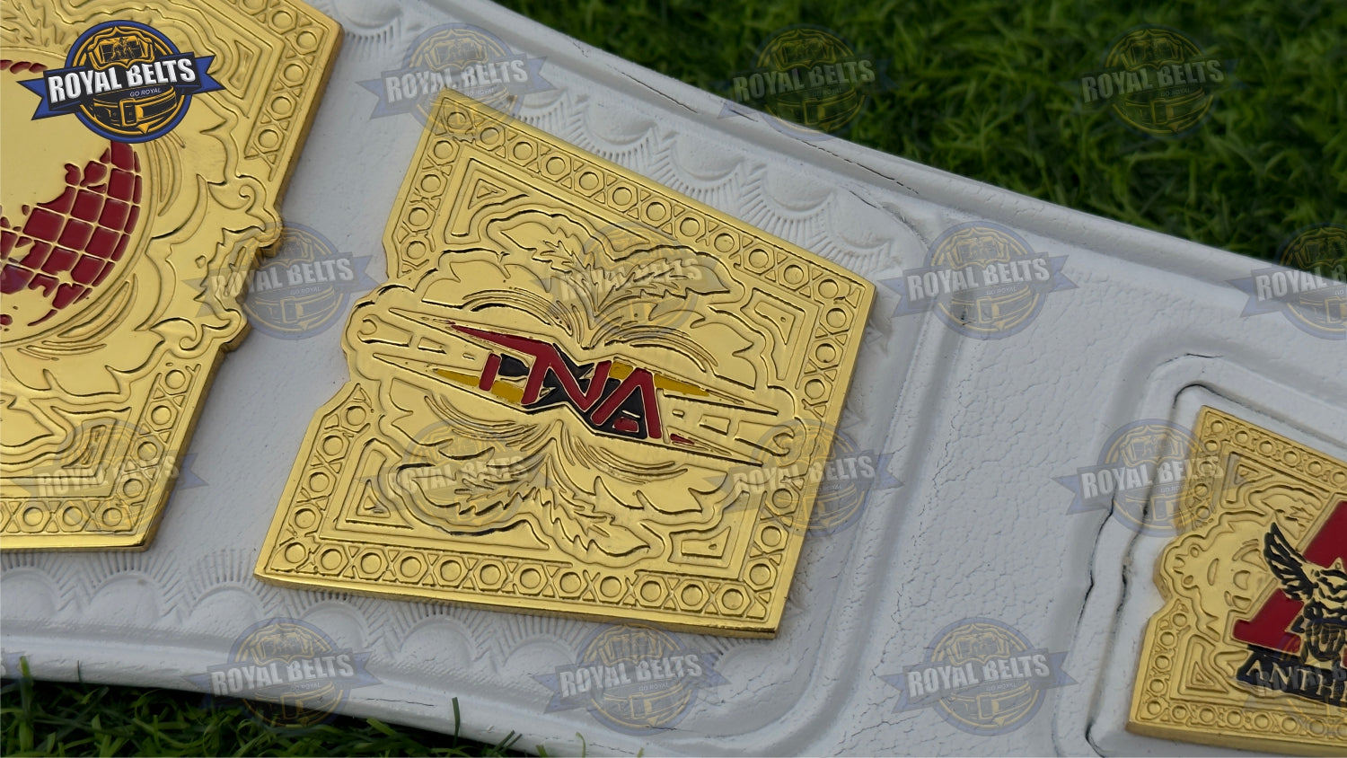 World Knockouts Title Belt with mirror finish gold and detailed side plates