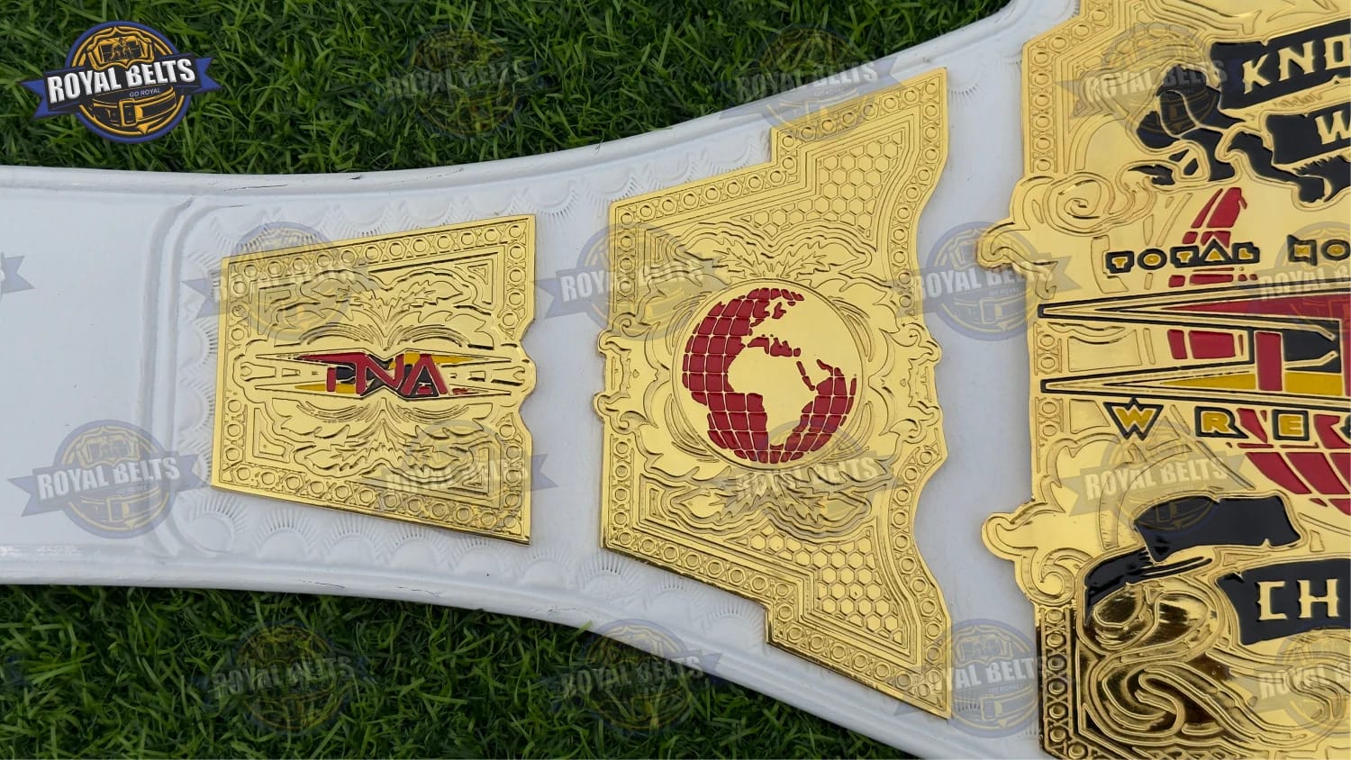 TNA World Championship Belt showcasing raised lettering and detailed engraving Made by Royal Belts
