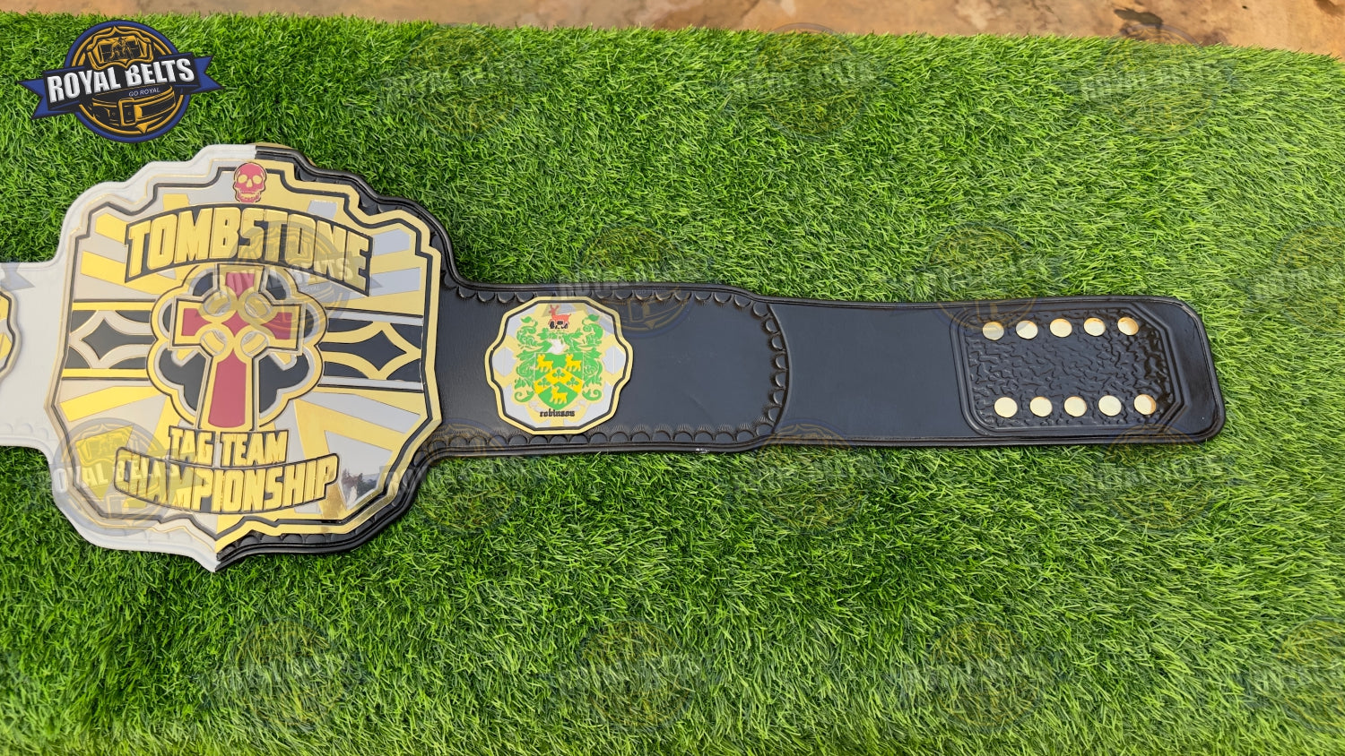 TOMBSTONE championship title belt with beveled gold edges and bold custom design