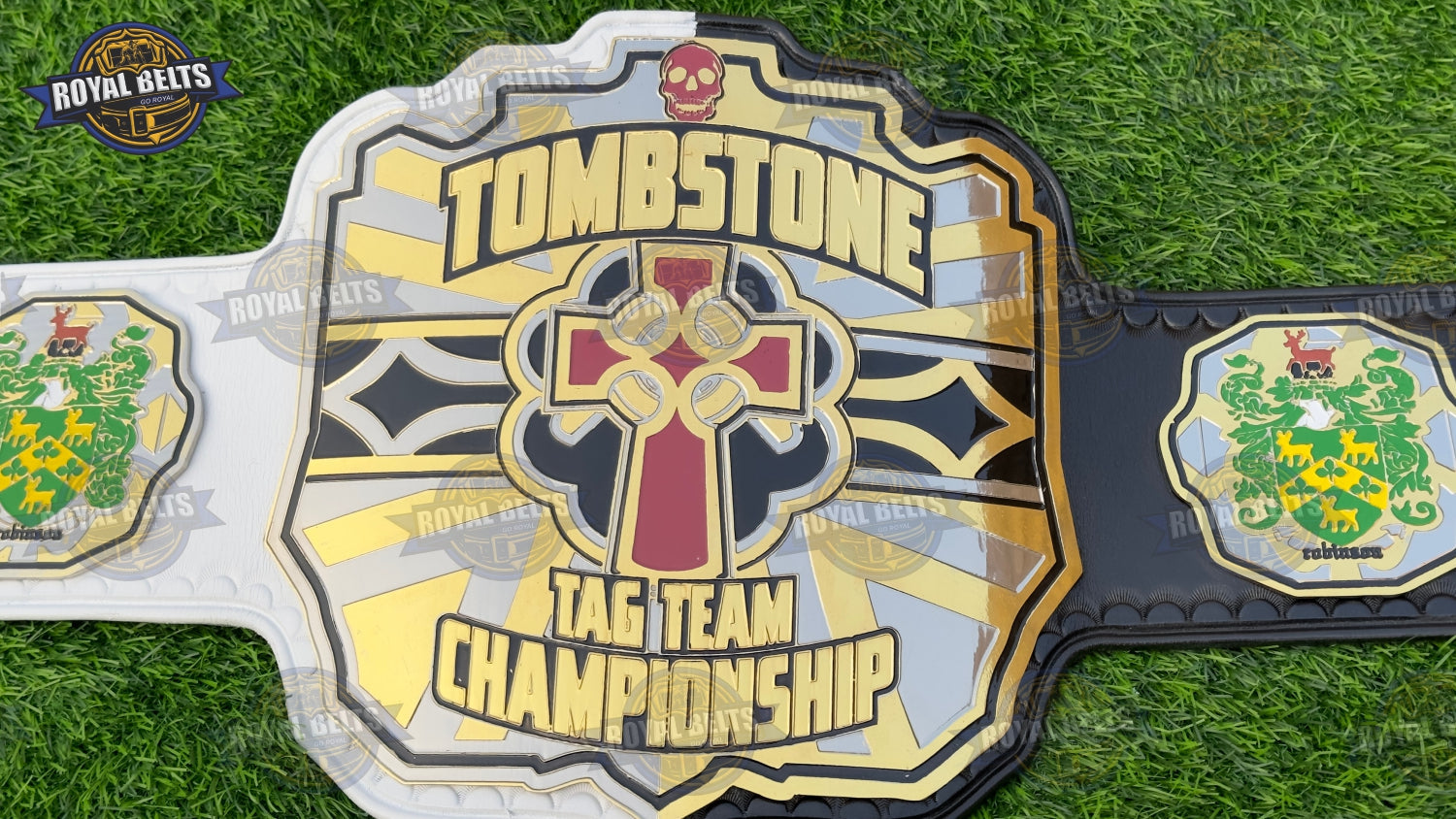 TOMBSTONE championship belt with gold engraved side plates , polished center