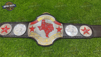 Heavyweight wrestling title belt featuring raised dual center plate, mirror polished finish, stitched leather backing Made by Royal Belts