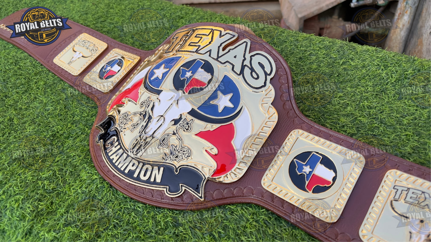 Texas Heavyweight title belt with beveled gold plates, engraved lettering, adjustable leather strap