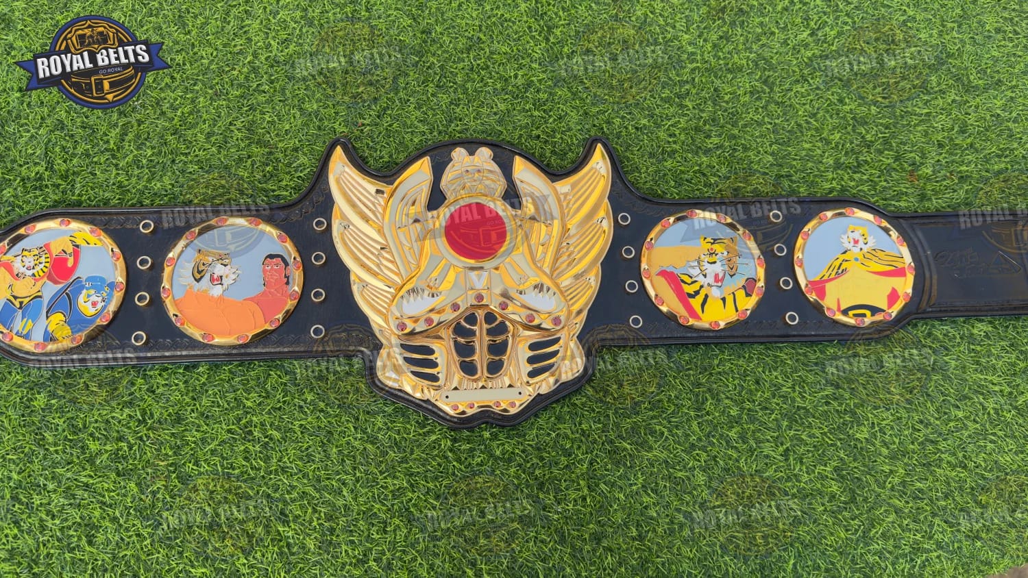 Tiger Mask Naoto Title Belt featuring engraved 3D logo and triple layer polished gold Designed by Royal Belts