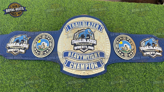 Trailblazer heavyweight title belt featuring engraved logo and mirror finished gold plates Designed by Royal Belts