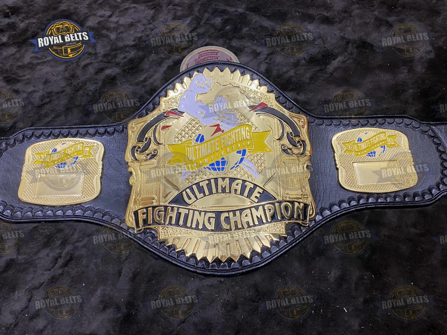 UFC Championship Title Belt beveled gold edges with engraved UFC emblem and black leather backing