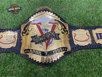 Ultimate Fighting Championship V belt featuring raised CNC HD center, mirror polished gold, stitched leather Made by Royal Belts