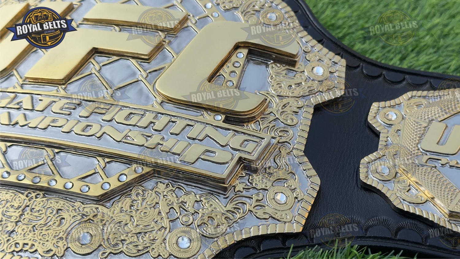 Triple stacked Ultimate Fight belt with multi layer gold center, detailed etching, premium leather backing