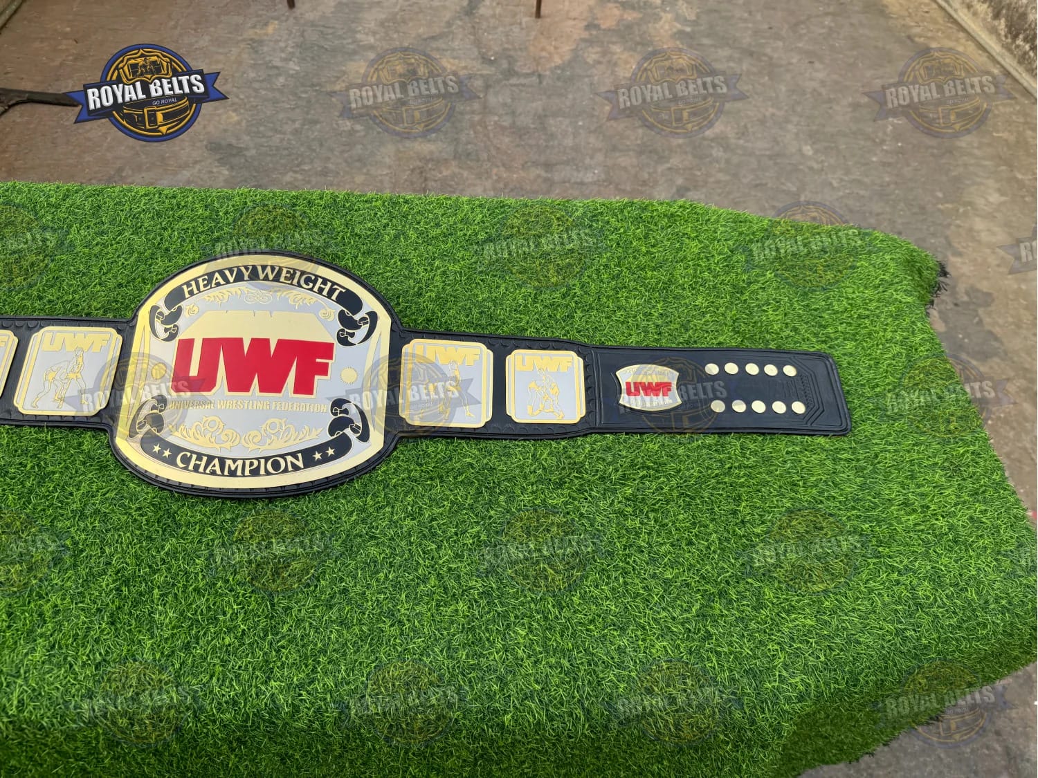 UWF Heavyweight Wrestling Title Belt classic heavyweight belt with raised engraved federation logo
