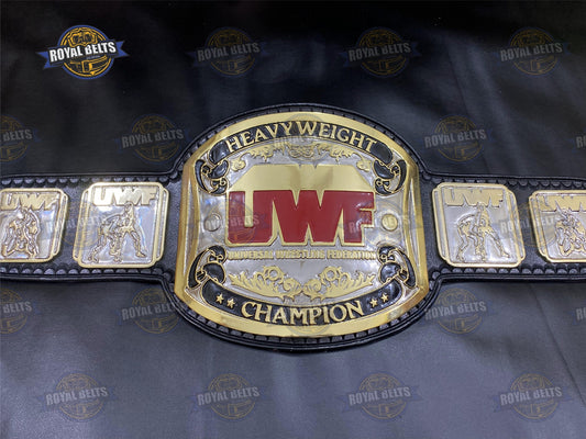 UWF Heavyweight belt with dual plated center plate, black stitched leather strap, HD CNC engraved logo Crafted by Royal Belts