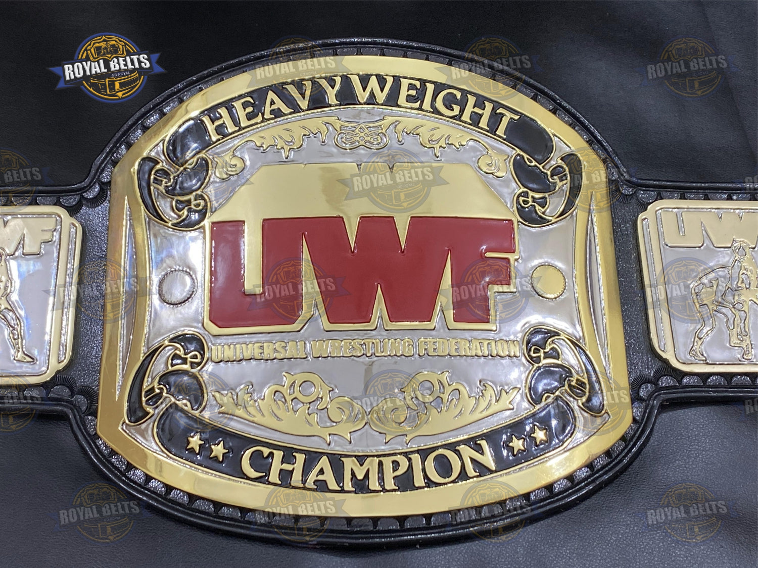 Heavyweight championship belt featuring raised center plate, polished zinc, thick black leather backing Crafted by Royal Belts