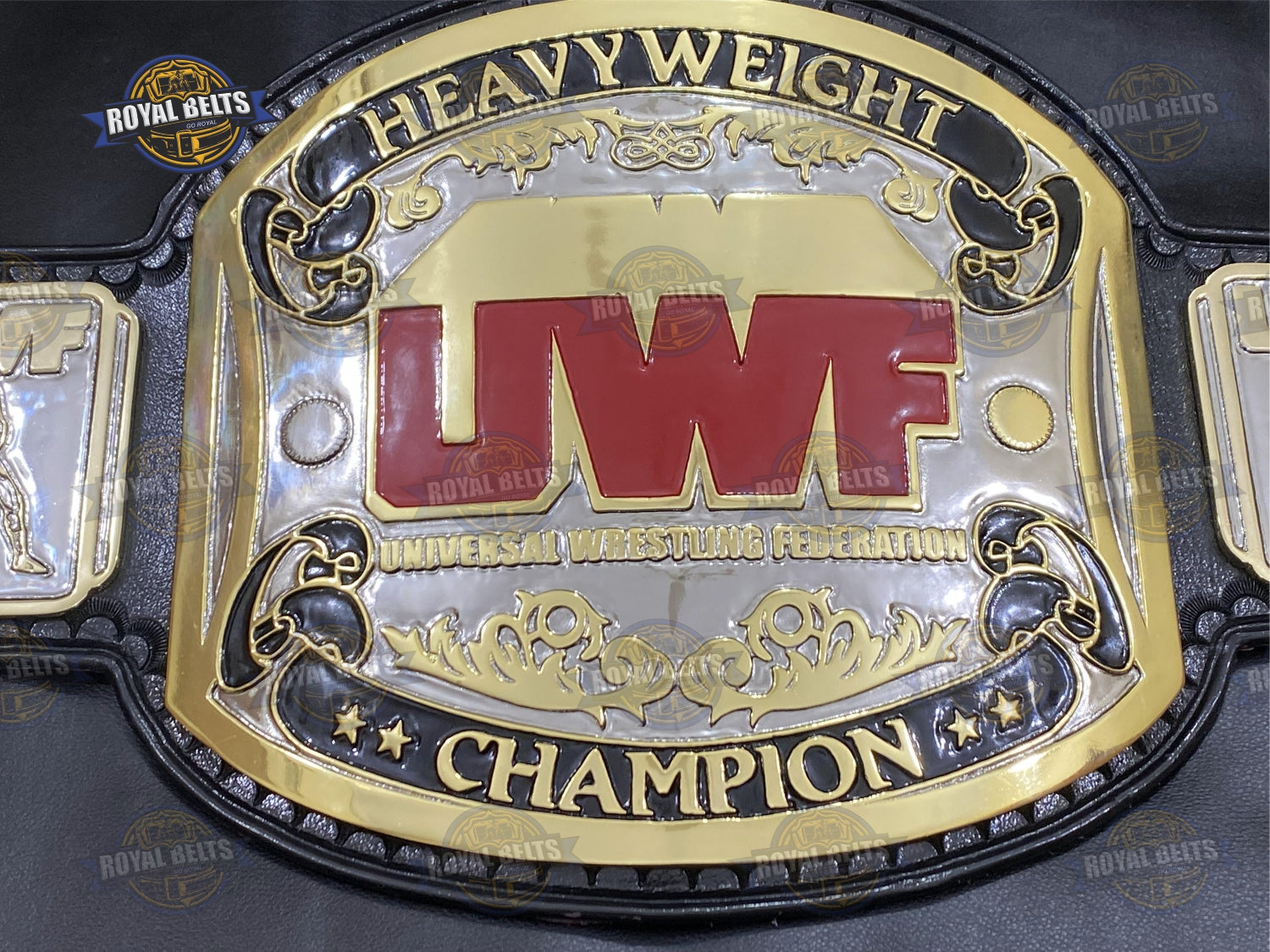 Custom UWF belt with layered gold center plate, engraved side plates, stitched premium black leather strap Crafted by Royal Belts