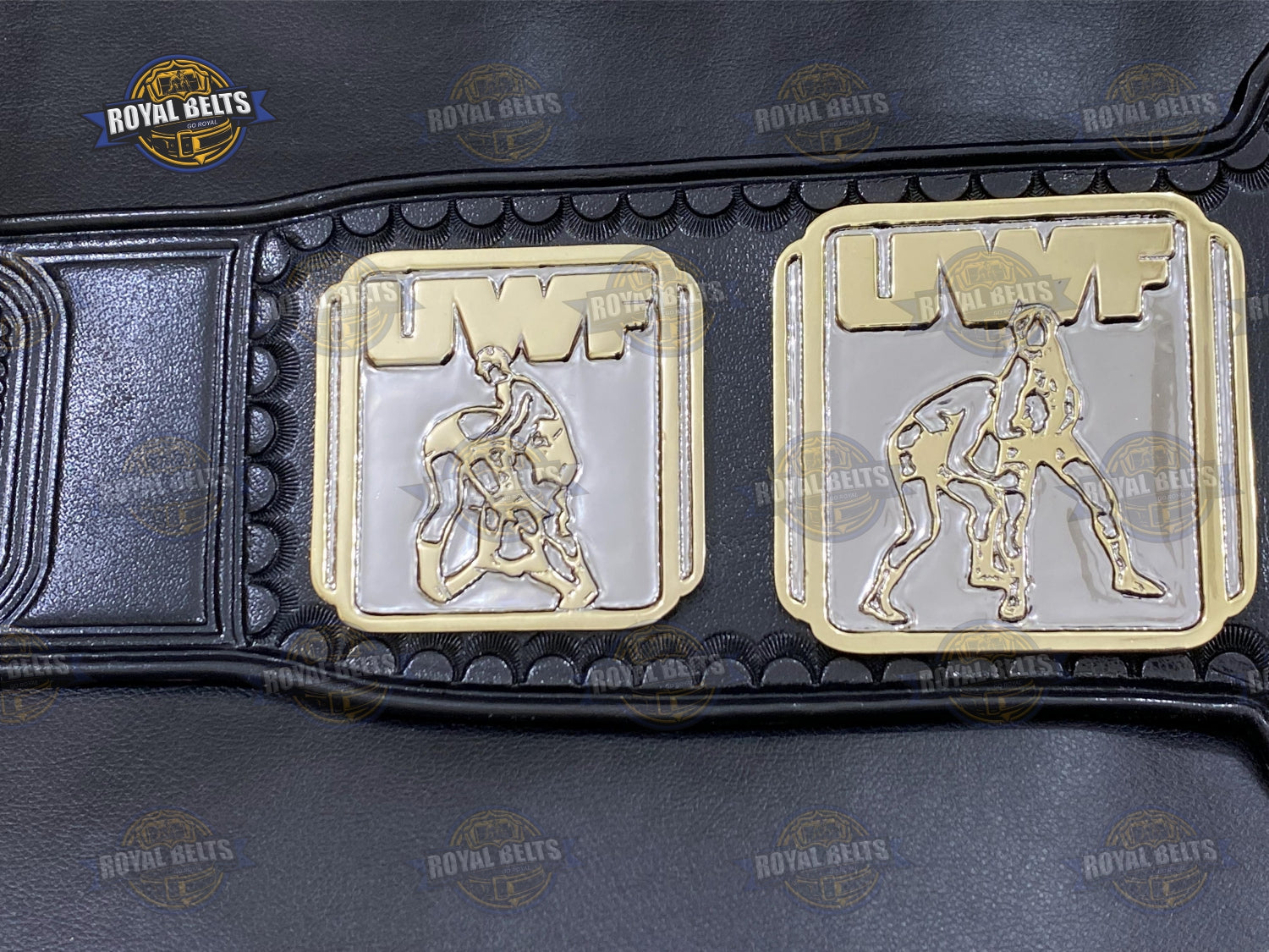 Championship belt with multi layer gold center plate, engraved logos, polished dual, stitched black leather strap