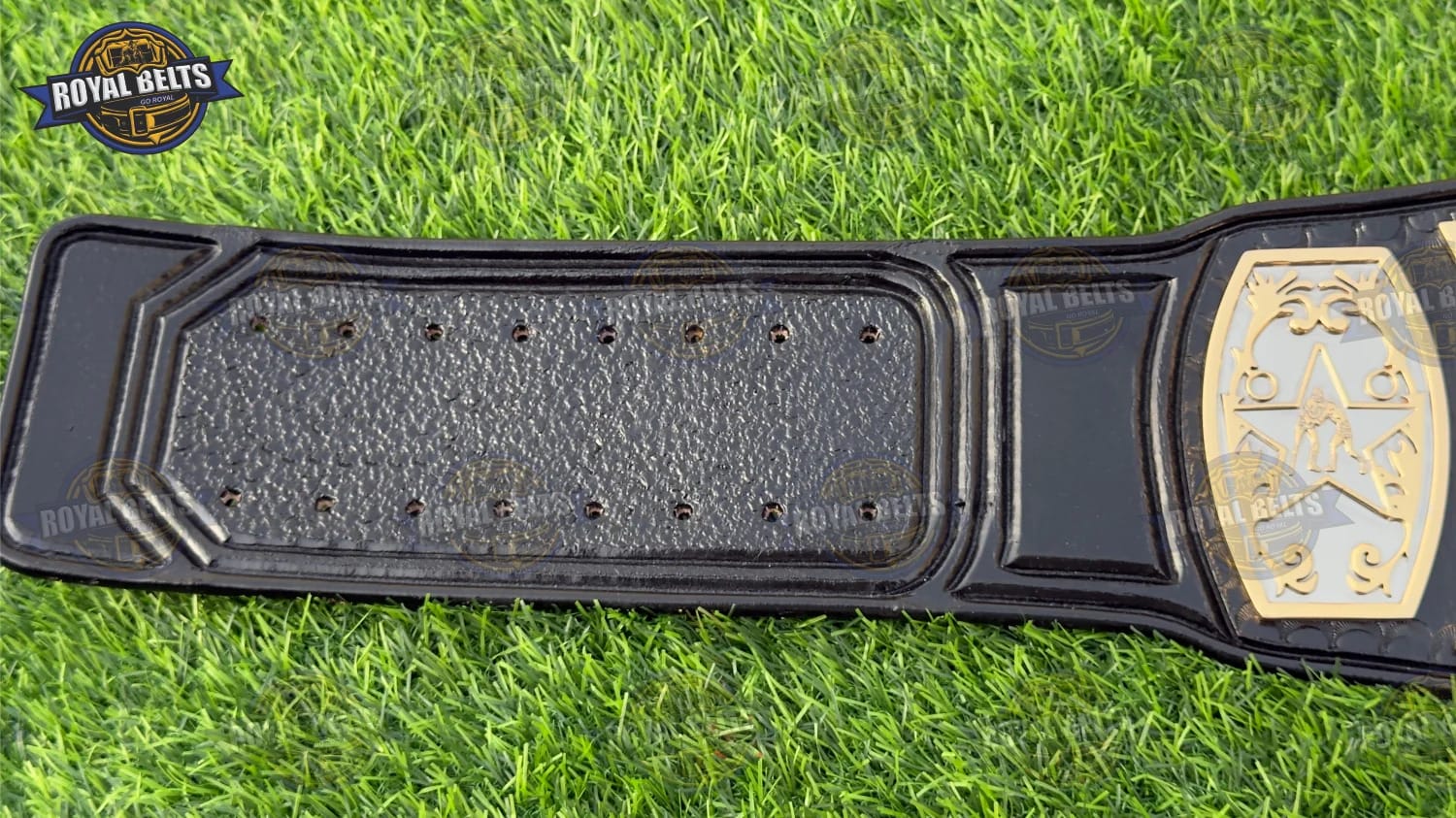 Custom UWF Universal TV belt with multi layer center plate, CNC engraved detailing, snap closure leather