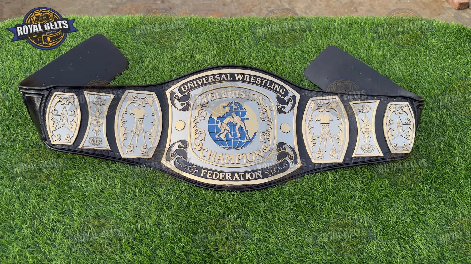 Custom UWF TV wrestling belt featuring ornate CNC side plates, detailed engraving, premium leather strap