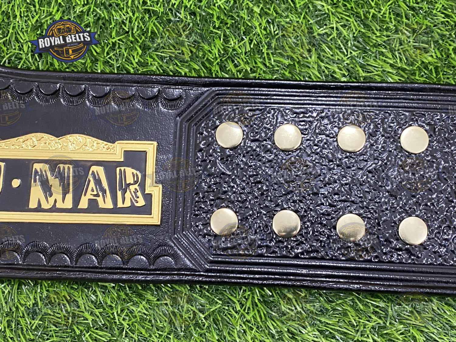 Custom WCW Cruiserweight belt with mirror polished gold plates, engraved center emblem, black stitched leather