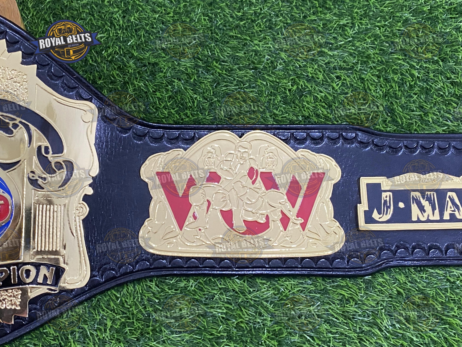 WCW belt with engraved side plates, HD CNC detailing, durable stitched black leather backing