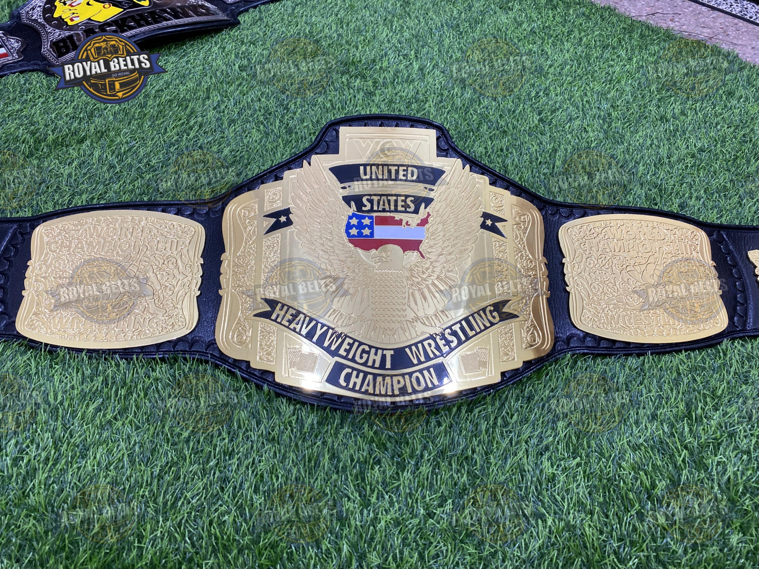 Custom WCW US 3 Plated championship belt featuring ornate side plates, detailed engraving, leather strap